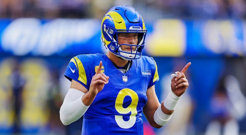 Matthew Stafford of Los Angeles Rams pointing up with both fingers.
