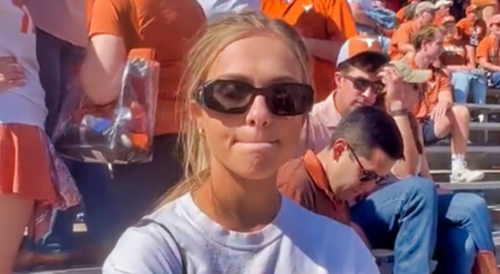 Female Texas Longhorns fan wearing sunglasses