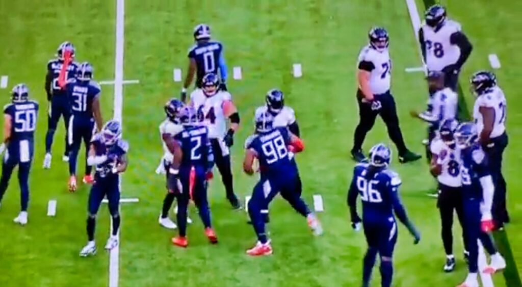 Screenshot of Ravens and Titans players after a play.