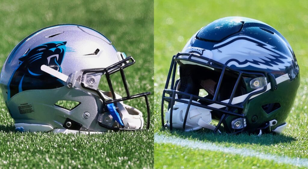 Panthers and Eagles helmets on the grass.