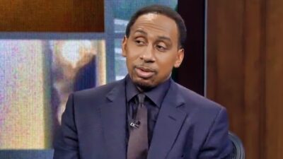 Stephen A. Smith in suit on set