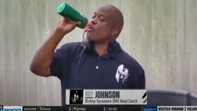 Roy Johnson drinking from bottle
