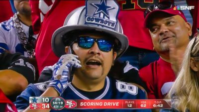 Cowboys fan on phone