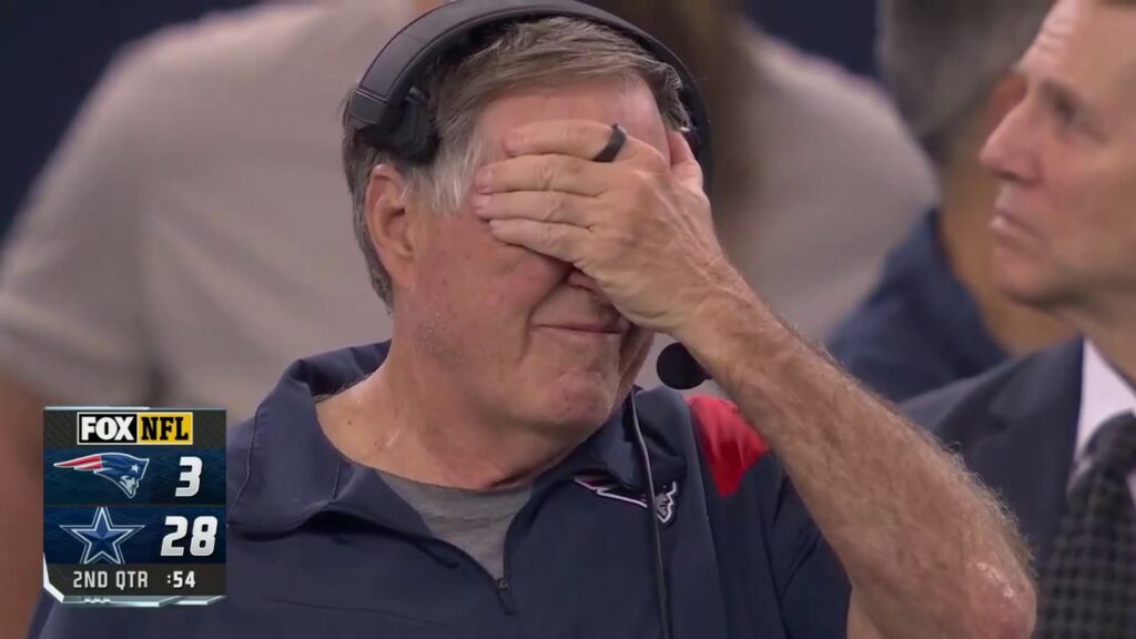 New England Patriots' head coach Bill Belichick reacting.