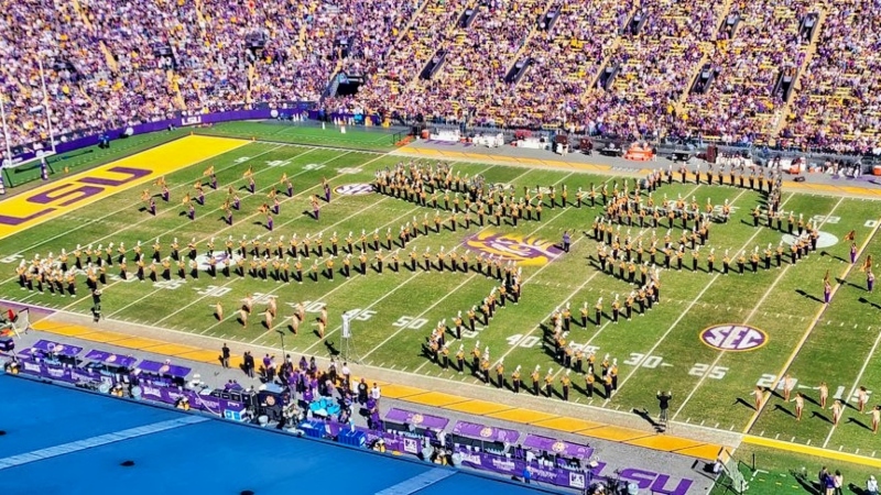 LSU band forming the Heisman Trophy pose at halftime.
