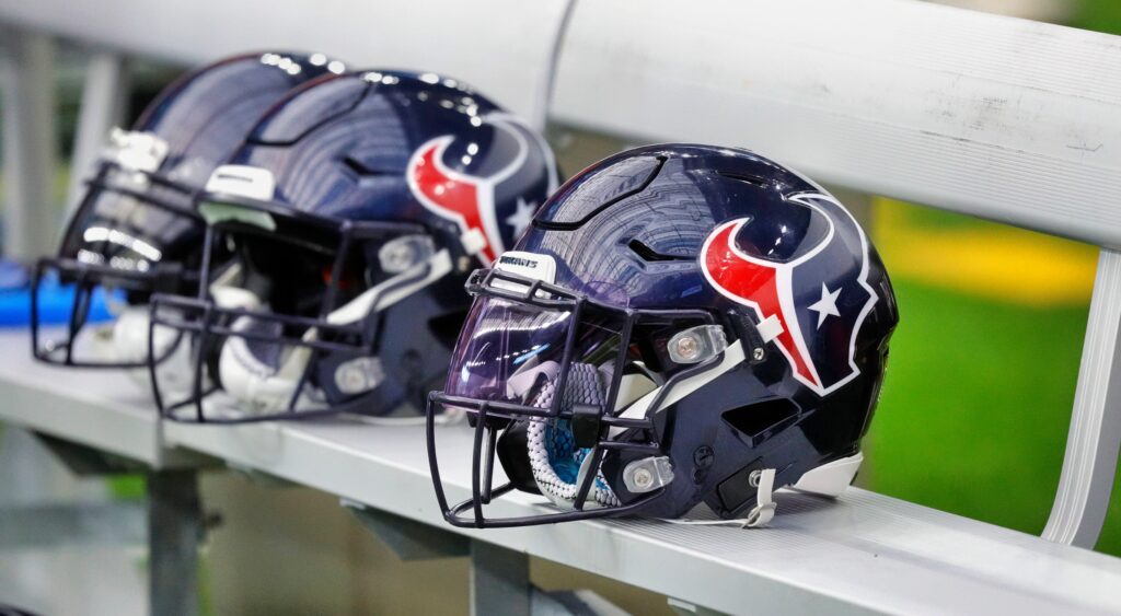 Texans helmets on the bench.