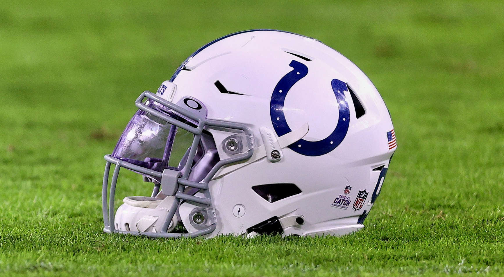 Colts helmet on field.