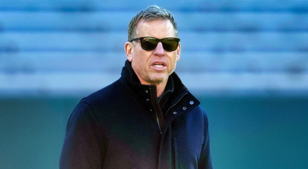Troy Aikman in sunglasses and coat