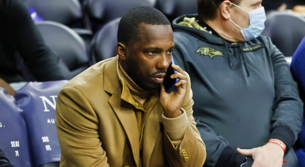 Rich Paul holding a cell phone to his ear
