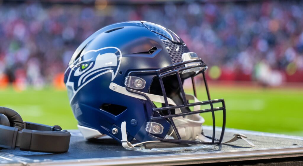 Seattle Seahawks helmet shown at field.