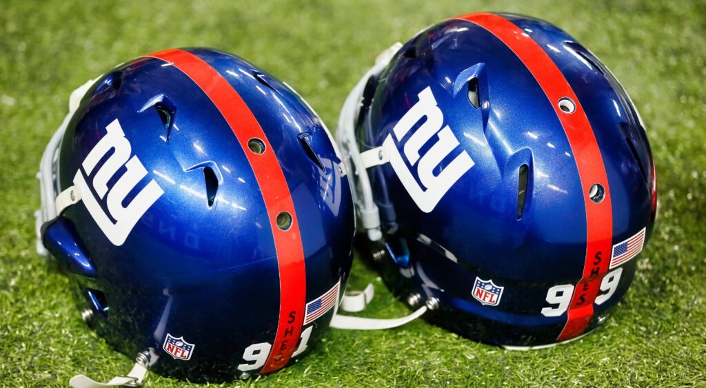 New York Giants helmets on the field.