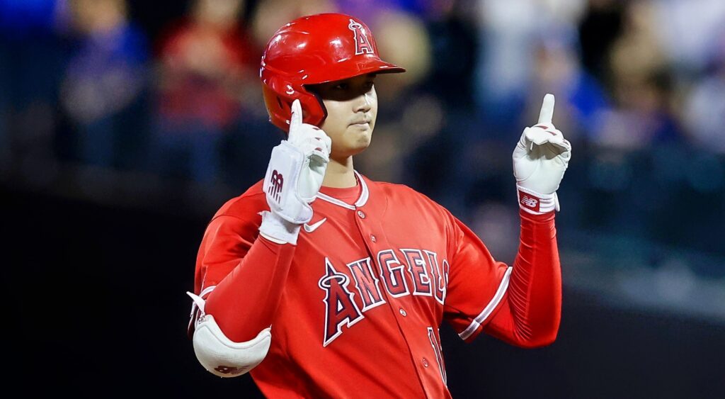 Los Angeles Angels star Shohei Ohtani pointing up after a double.