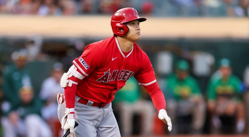 Shohei Ohtani of Los Angeles Angels looking ahead after hitting ball.