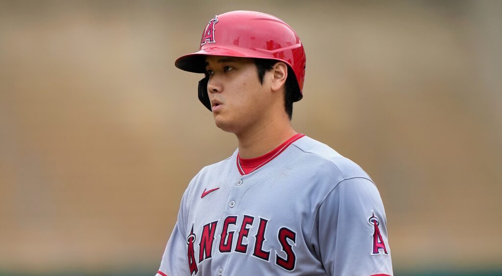 Los Angeles Angels star Shohei Ohtani looking on while at first base.