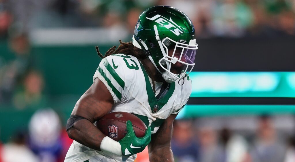 Dalvin Cook of New York Jets running with football.