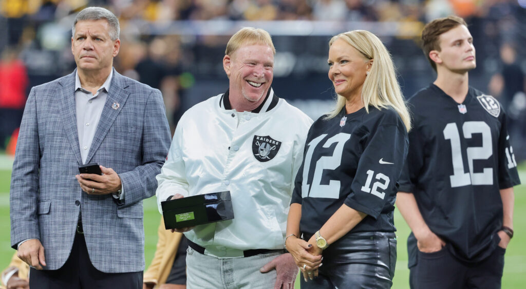 Mark Davis smiling with other Raiders brass