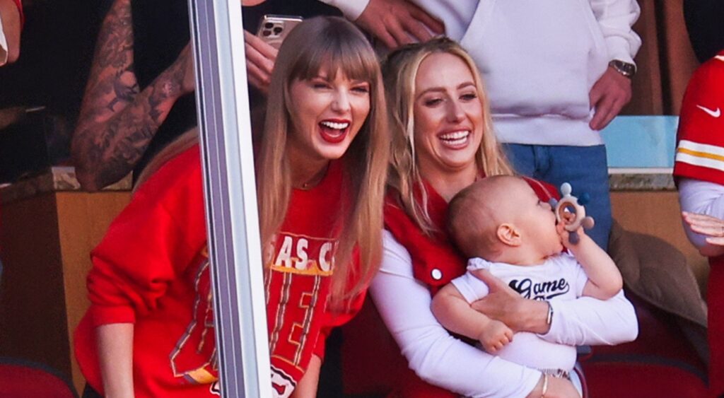 Taylor Swift and Brittany Mahomes smiling at game