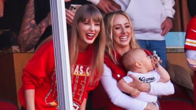 Taylor Swift and Brittany Mahomes smiling at game