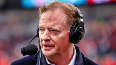 Roger Goodell with a headset on