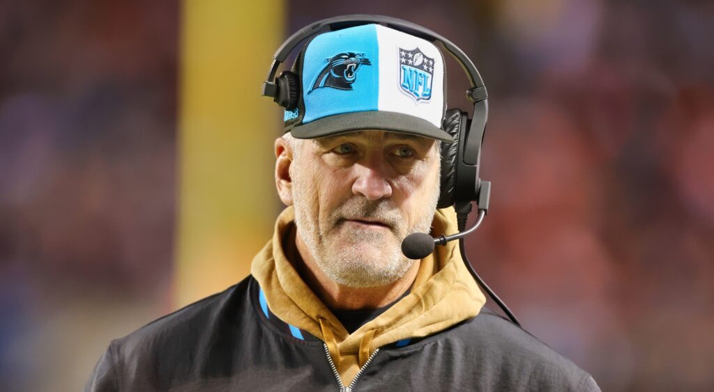 Frank Reich of Carolina Panthers looking on.