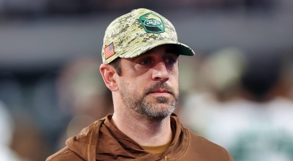 Aaron Rodgers in Jets Cap and hoodie