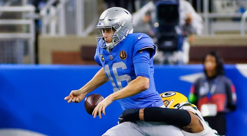 Jared Goff of Detroit Lions trying to avoid a sack.