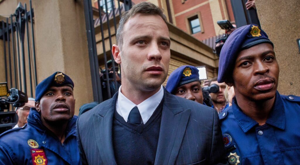 Oscar Pistorius leaves the court room.