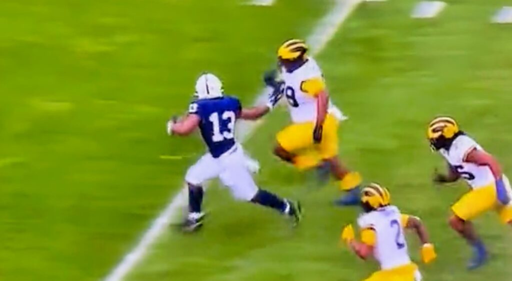 Michigan DT making a tackle.