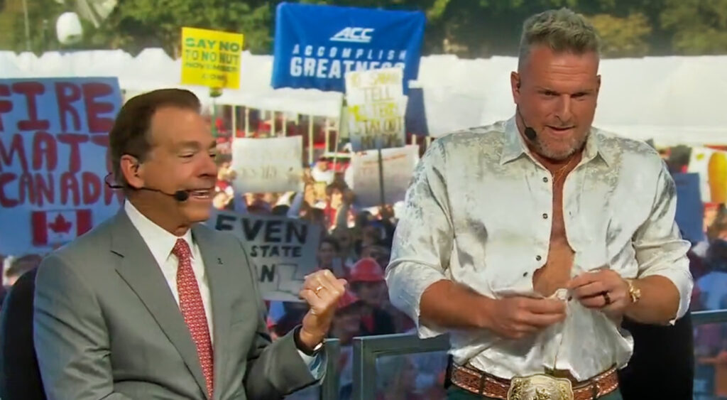 Pat McAfee unbuttoning his shirt on College GameDay