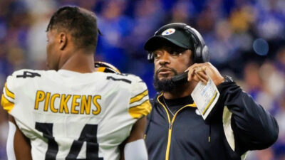 Mike Tomlin standing in front of George Pickens