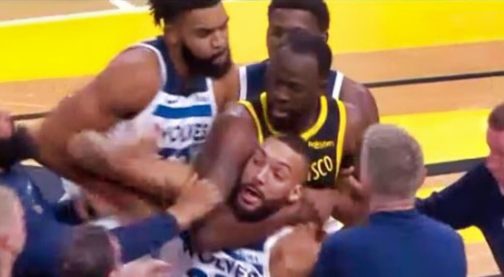 Draymond Green putting Rudy Gobert in a chokehold.