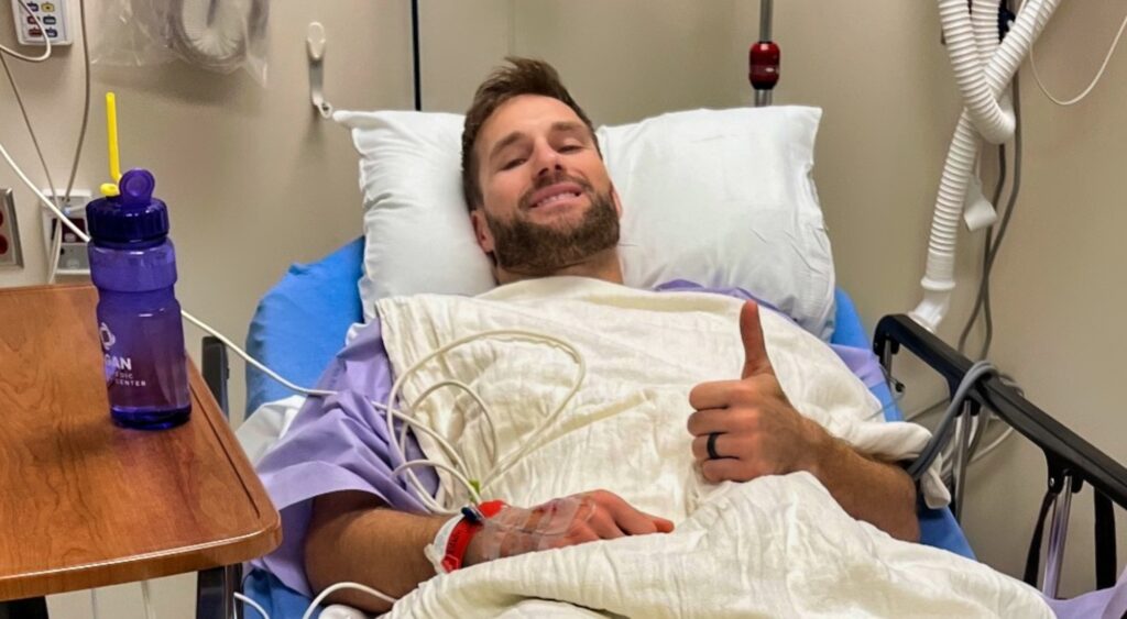 Kirk Cousins in hospital bed