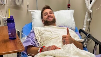 Kirk Cousins in hospital bed