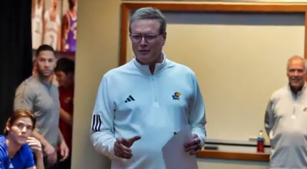 Bill Self speaking to players in locker room