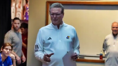 Bill Self speaking to players in locker room