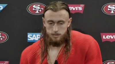 George Kittle speaking to reporters