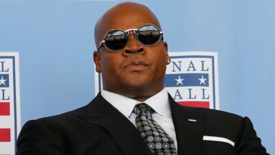 Frank Thomas in sui and sunglasses