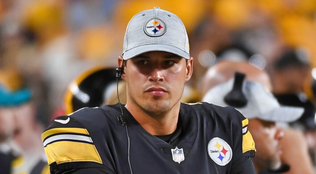Pittsburgh Steelers quarterback Mason Rudolph looking on.