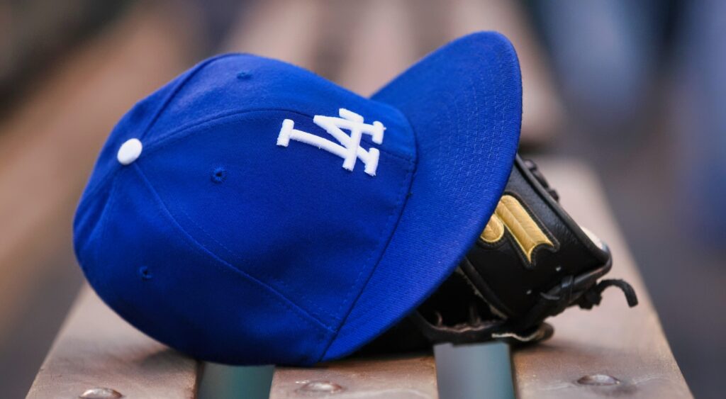 Dodgers hat on the bench.