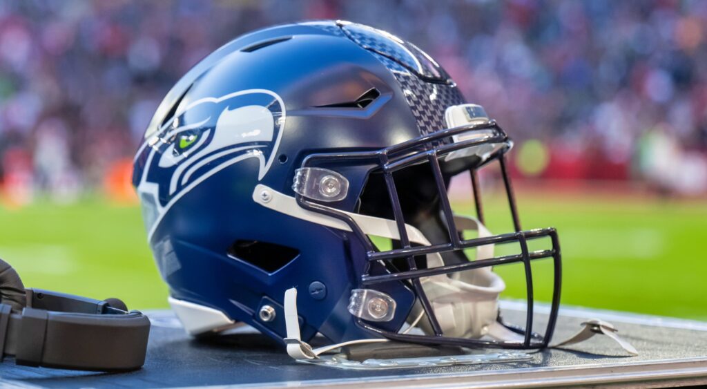 Seattle Seahawks helmet on ground.