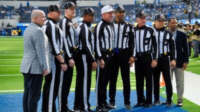 refs posing for picture
