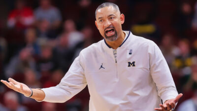 Juwan Howard with his arms open