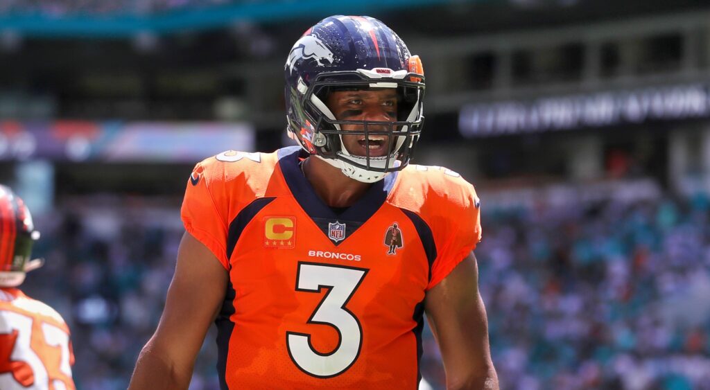 Russell Wilson of Denver Broncos reacts after throwing touchdown.