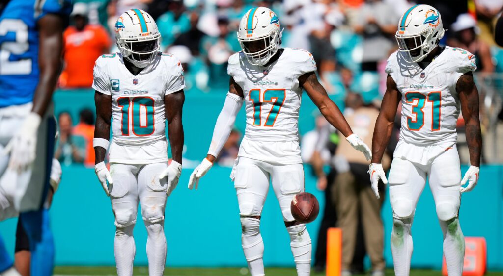 Miami Dolphins players in uniform