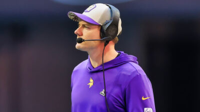 Kevin O'Connell in Vikings gear and headset