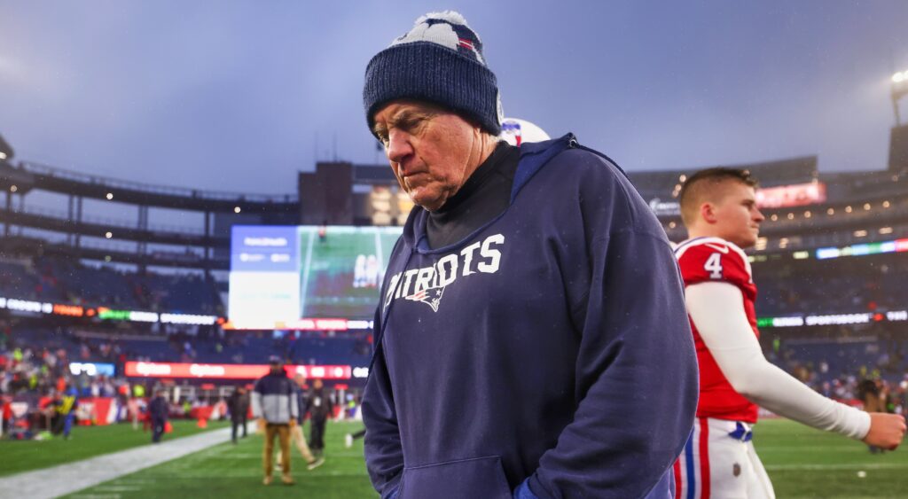 Bill Belichick with his head down