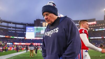 Bill Belichick with his head down
