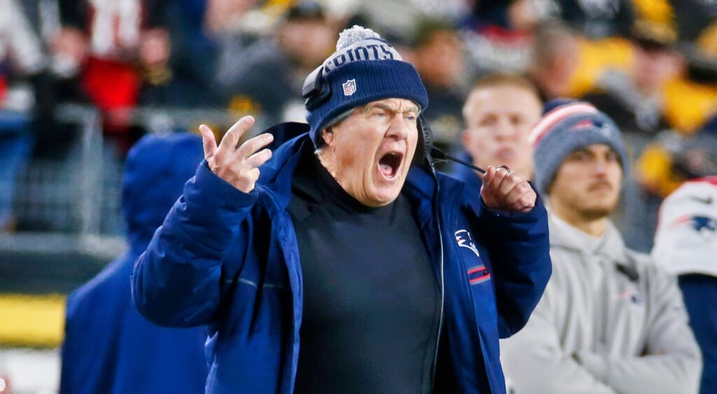 New England Patriots head coach Bill Belichick reacting during game.