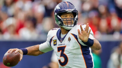 Russell Wilson throwing a football