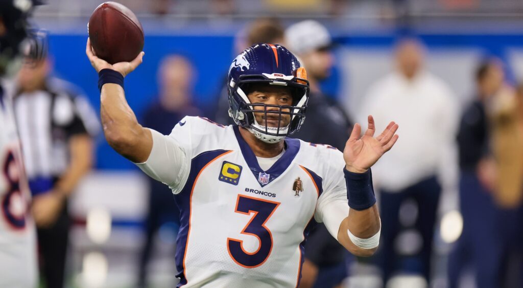 Russell Wilson of Denver Broncos throwing ball during warmups.